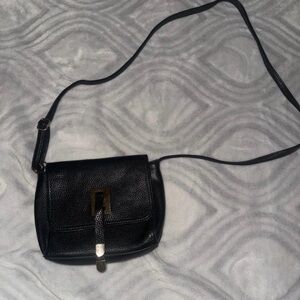 Chic Black Crossbody Bag with Gold Accent